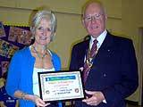 Middleton Rotary Club President Jim Kenyon awards Music scholarship