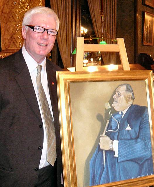 Paul Rowen MP alongside the portrait of Sir Cyril Smith.