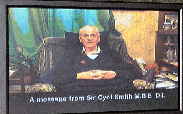 Sir Cyril sends his message via a pre-recorded DVD.