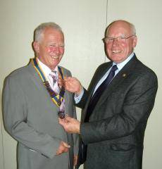 Norman Wellens the 75th President of the Rotary Club of Middleton with retiring President Jim Kenyon