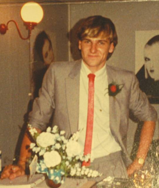 A 23-year old Greg Couzens at the opening of his hair salon in 1983.