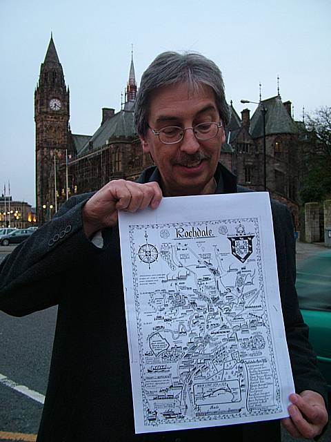 Spotland Area Forum Secretary Mick Coats with the 1927 map of Rochdale.