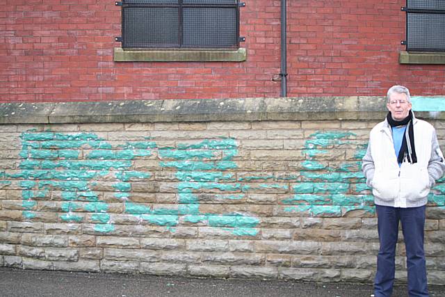 Dennis Rigg at the scene of the graffiti, which has now been painted over, at Zion Baptist Church.