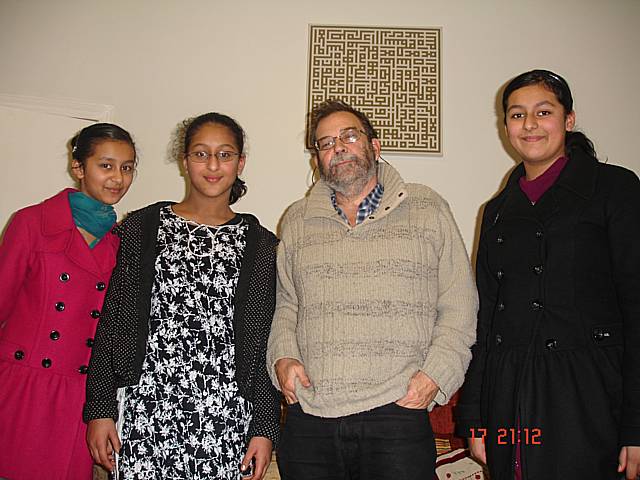 Sisters Harisah, Armani and Alina Khaliq with author Jan Needle.