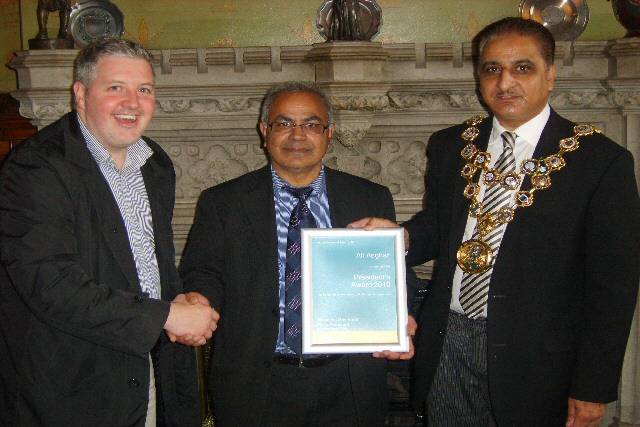 Councillor Dale Mulgrew,Mr Asghar with this award and the Mayor of Rochdale