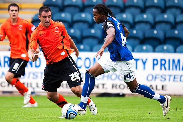 Rochdale 0 - 0 Hartlepool<br />
Jean Louis Agpa-Akpro powers forward with Hartlepool's Peter Hartley ready to tackle