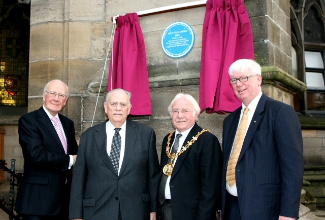 Rt. Hon Sir Menzies Campbell MP, Norman Smith, Mayor Godson and Paul Rowen stood below the blue plaque in memory of Sir Cyril Smith