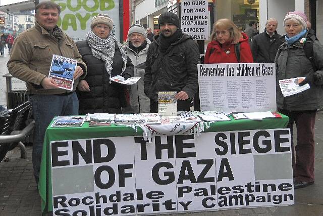 Rochdale PSC members: Andrew Wastling, Linda Clair, George Abendstern, Kashaf Bhatti, Jenny Turner and Pat Sanchez at the stall on 22 January 2011