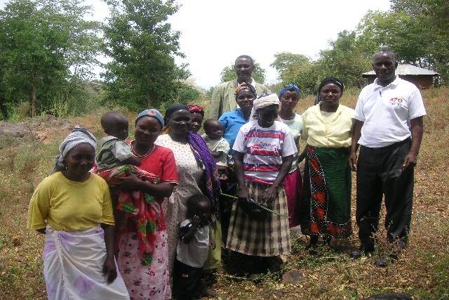 A few of the women from the community with two Meru Rotarians 