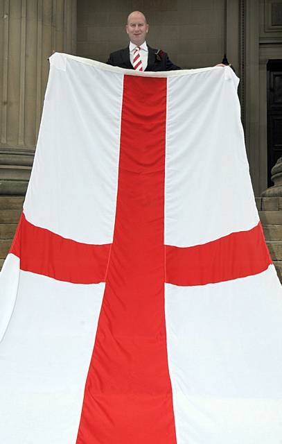 Paul Nuttall with the flag of St George