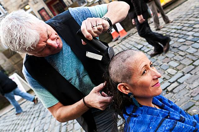 Isabelle Walker-Lefebvre having her head shaved by John Peers