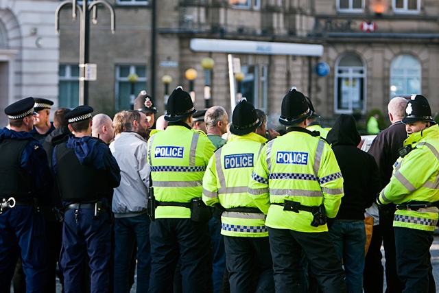 National Front demonstrators surrounded by police outside Rochdale Town Hall