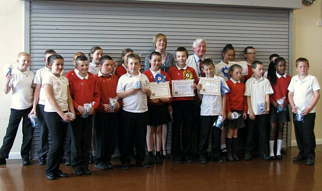 Pupils from year six at Bowlee School with Sue Furby and John Brooker from The Rotary Club of Middleton 