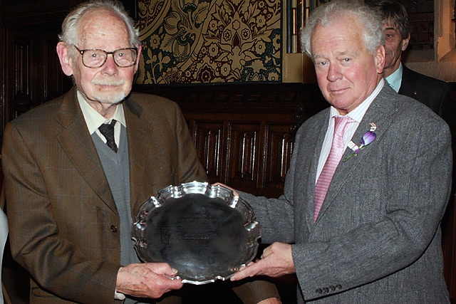 Norman Wellens, Man of Rochdale 2012, presents John Whyman with his Man of Rochdale 2013 award
