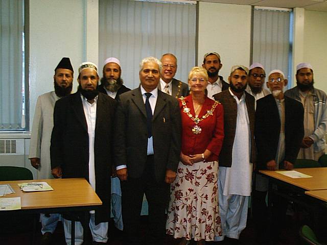 1st row, the late Maulana Muhammad Azam Chishti, Ghulam Rasul Shahzad OBE, the former Mayor Councillor Jean Hornby and Maulana Masood ur Rehman
