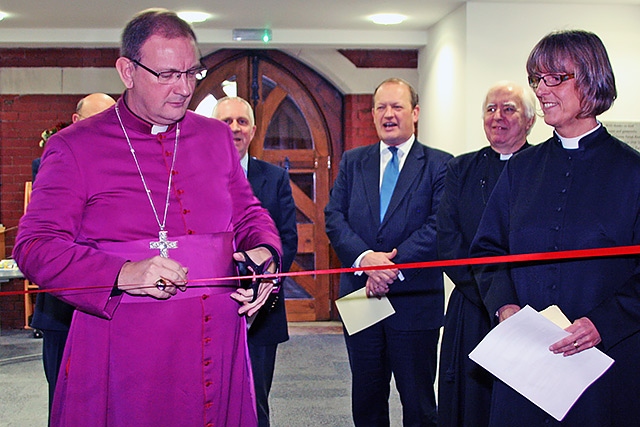 The Bishop of Middleton, the Rt Rev Mark Davies cuts the ribbon to officially open the new St Andrew's Church community centre