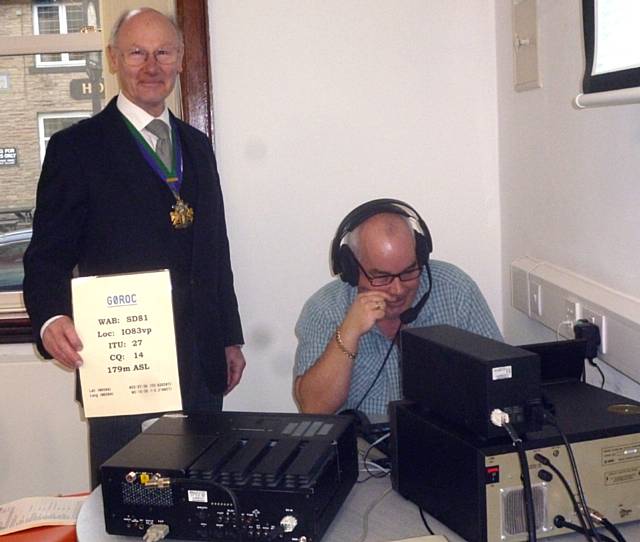 Mayor Jim Gartside with Mike Capper busy on the radio 