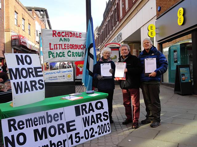 Rochdale and Littleborough Peace Group members (Pat Sanchez, Trevor Hoyle, Patricia Gilligan and Philip Gilligan) at the stall in Yorkshire Street on Saturday 16 February 2013 
