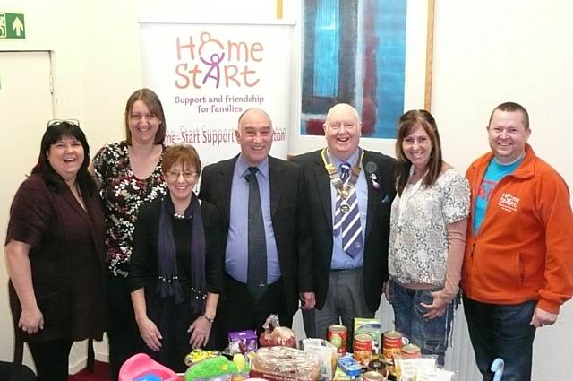 The Rotary Club of Middleton presents Home-Start (Rochdale) with £400