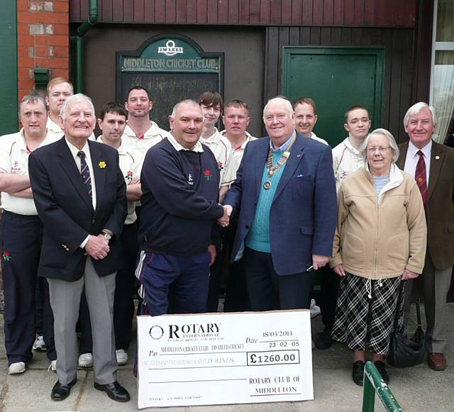 Rotary Club of Middleton presents a cheque to The Middleton Cricket Club Disabled Cricket team