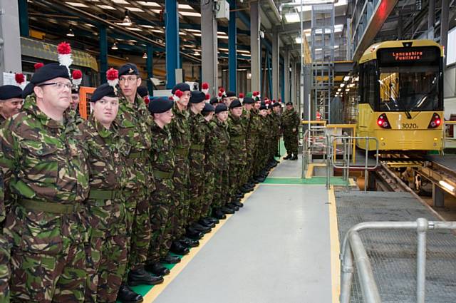 Fusiliers on parade to welcome the new ‘Lancashire Fusilier’ tram into service