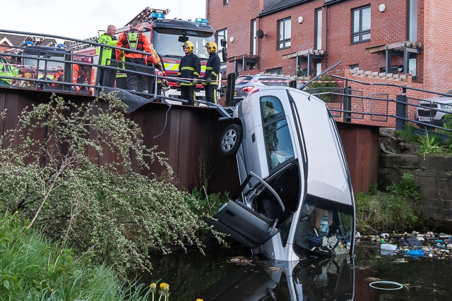 The car demolished the barriers and nosed dived into the canal