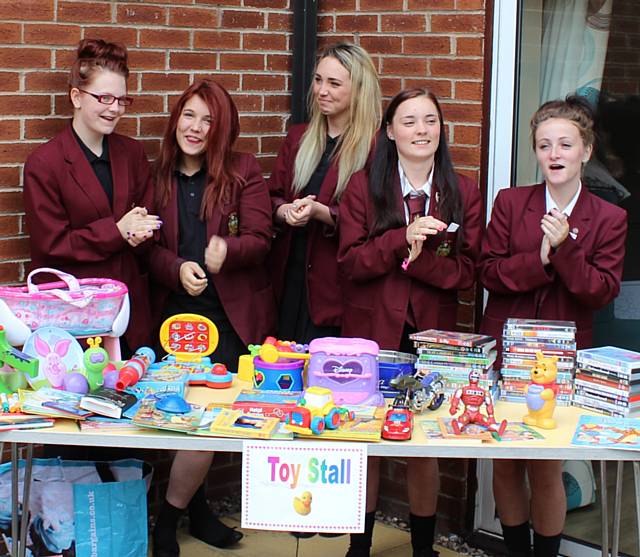 Siddal Moor students manning the Bric-a-Brac stall and the Toy stall which helped to raise money for the resident’s fund