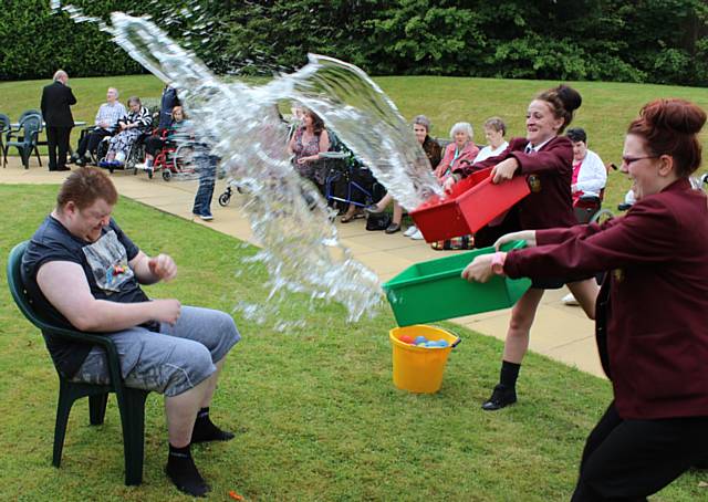 Robert Blakebrough got into the swing of things when he allowed himself to be soaked to raise money