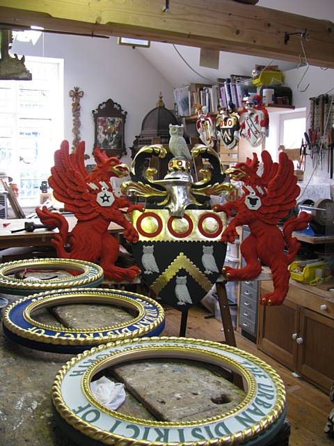 Oldham Coats of Arms when work was in progress in the workshop