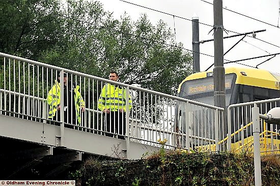 Police on the scene at the fatal incident at Freehold station, Block Lane