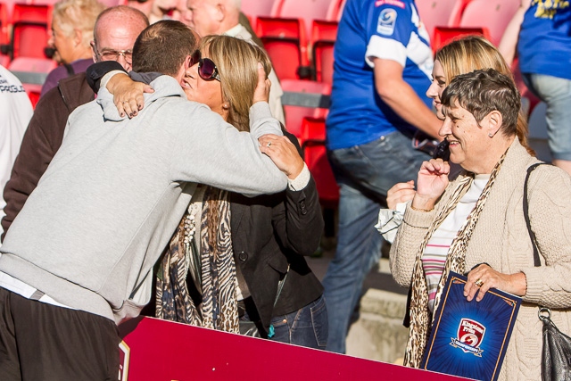 Hornets coach Ian Talbot gets a hug and a kiss as he steered the club to their first trophy in 91 years in the Championship One Final in 2013