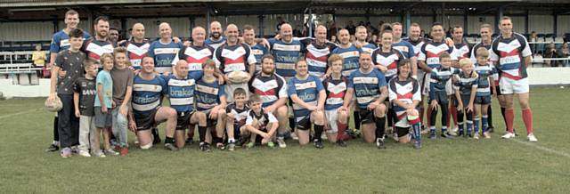 Chris Hough with the two teams for the testimonial game