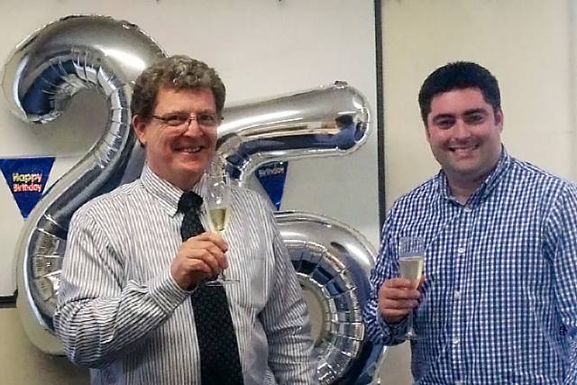 Managing Director Steve Berry and Operations Director Daniel Calvert celebrating the 25th anniversary of Bamford Contract Services