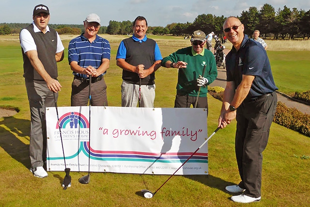 David Harris (right) with Business Society golfers at the charityevent