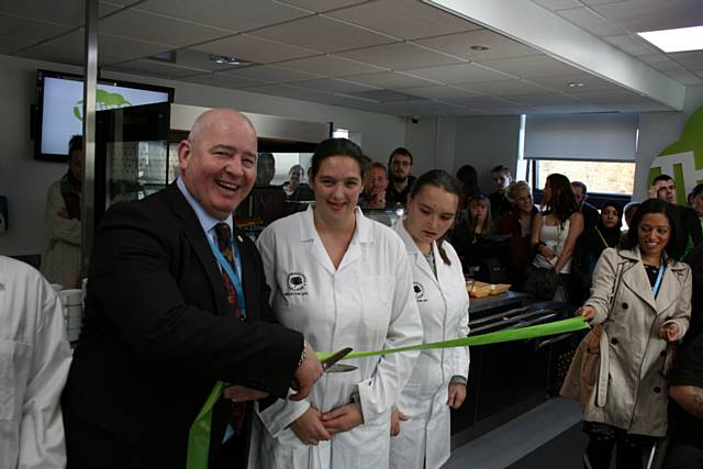Hopwood Hall College Principal Derek O’Toole cutting the ribbon at the grand opening last week, with Skills for Life Amie Lord and Keelie Murphy, with Nimisha Mistry, Quality Manager For Equality & Diversity and Learner Experience, holding the ribbon