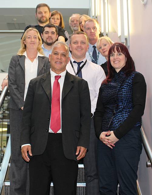 Councillor Daalat Ali (front) with the Partnership Enforcement Team based at Rochdale Police Station