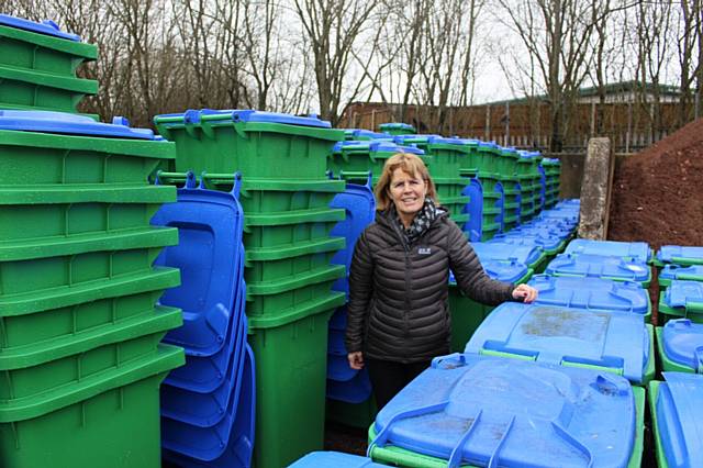 Councillor Jacqui Beswick with the new recycling bins ready to go out