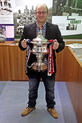 Martin Ballard with the Rugby League Grand Final Trophy in the Hornets Archive Room