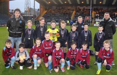 Youngsters from Hopwood Primary School and Whittaker Moss Primary School with their trophies