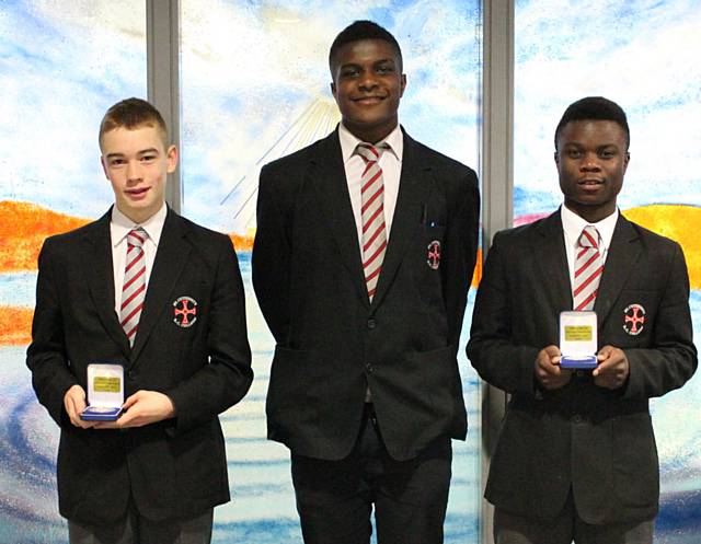 Connor Ronan, Jonathan Diba and Kisimba Kisimba showing their medals from the victorious U16 ESFA Inter County Trophy