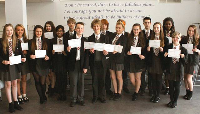 Pupils from St. Cuthbert’s RC High School celebrating with their certificates from the UKMT Intermediate Maths Challenge
