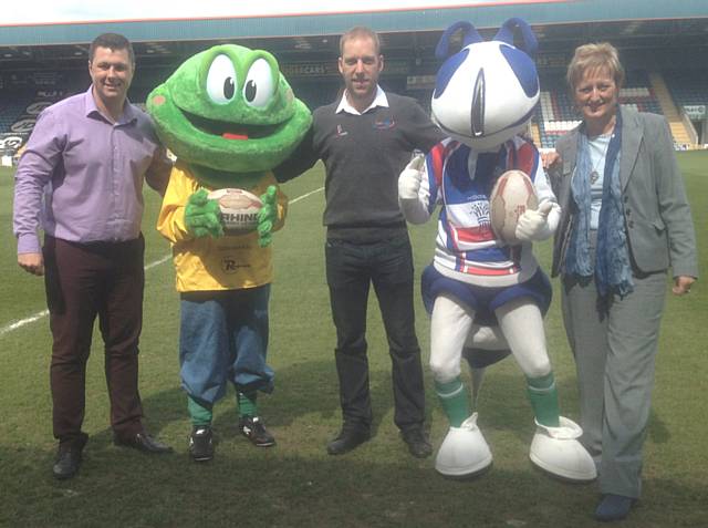Representatives from Hornets and Springhill Hospice join Will Purser, Shocka Sports and Hercules & Springy