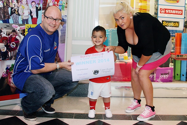 Wheatsheaf Centre Manager Martin Ballard with two-year-old Tai and his mum Stacey