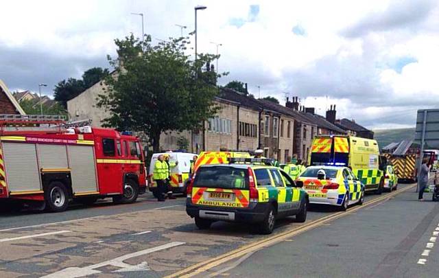 Road traffic accident at New Road with its junction at Smithy Bridge Road 