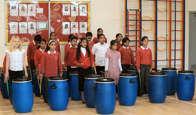 Hamer Drumming group in a recent assembly before the workshop event held at Heybrook Primary School