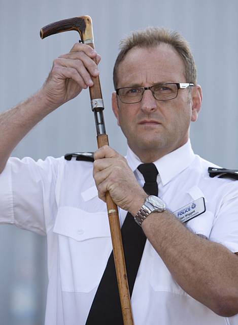 Assistant Chief Constable Ian Wiggett with the Shotgun disguised as walking stick 