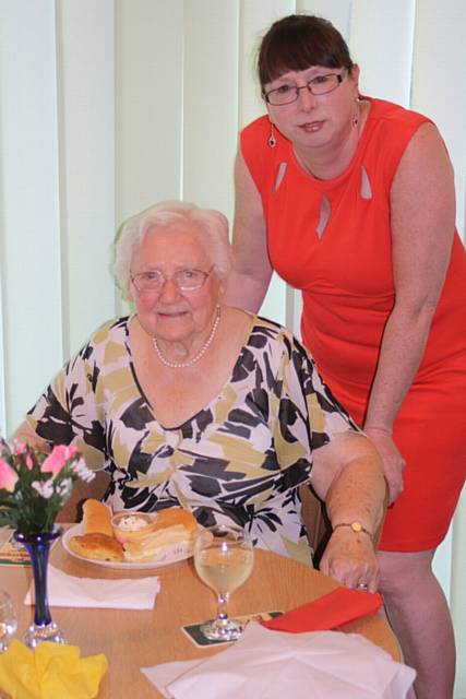 Warden Sue Buck with resident Audrey Collins
