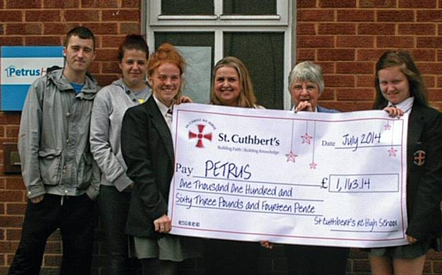 Staff, volunteers and service users from Petrus with pupils from St Cuthbert’s