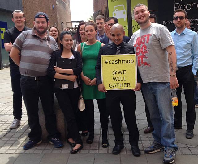 Cash mob in Rochdale town centre as part of Independent Retailers Month