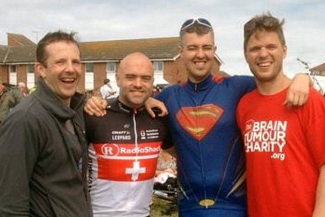 Scott Williams (in Superman outfit) and his friends on the bike ride to raise money for Brain Tumour Charity